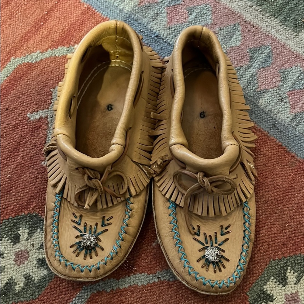 Fringed Tan Moccasins with Embroidered Details